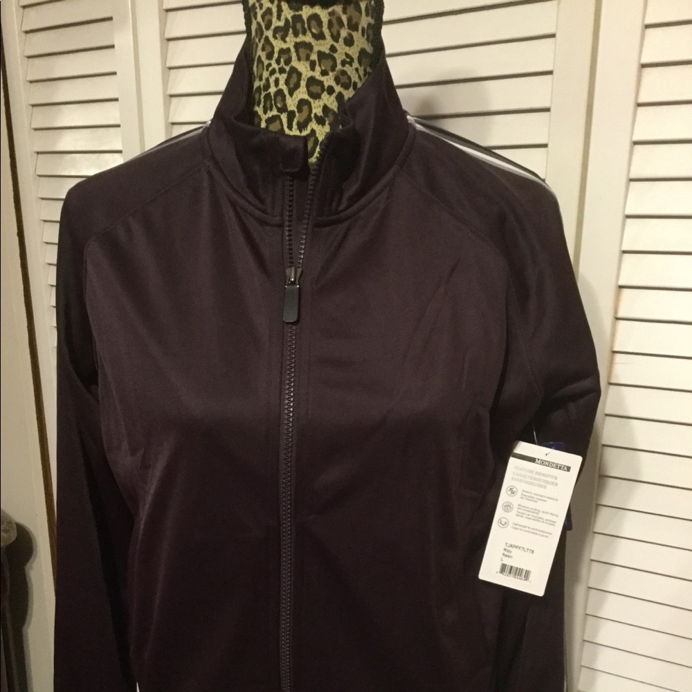 Mondetta athletics style zip up jacket.